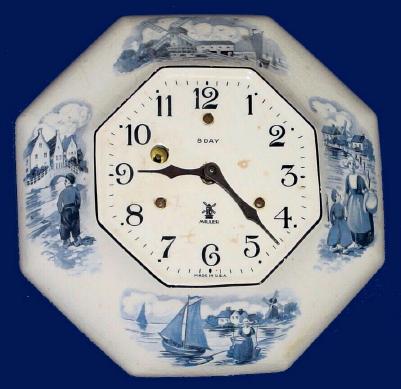 C.1930, Irving Miller &amp; Co., New York, "Holland" model kitchen clock in pattern 508, delft blue. — Antique Clocks Price Guide