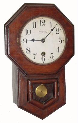 C.1911, Waterbury Clock Co., "Daintie No. 2", 8-day schoolhouse timepiece in good condition with a grain painted case. — Antique Clocks Price Guide