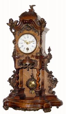 C.1866, German, Lenzkirch, Open Well mantel clock in excellent original condition, with the exception of possibly the dove on the tip top of the case. — Antique Clocks Price Guide