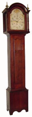 C.1825, Riley Whiting, Winchester, Conn., 30-hour time/strike tall clock. The cherry case is in quite nice condition with a crack in the two board base. — Antique Clocks Price Guide