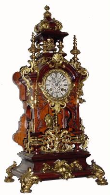 C.1880, French, Japy Freres, Open Well mantel clock in high Victorian style, with cast brass pieces applied to a walnut case in the German style. — Antique Clocks Price Guide