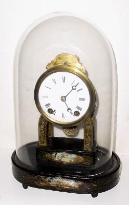 C.1870, Terry Clock Co., Waterbury, Conn., Skeleton Clock under dome in nice condition with the remains of the original base decorations and some minor paint loss and chips. — Antique Clocks Price Guide