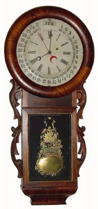 C.1870, Gilbert Round Drop wall regulator, weight driven, with Maranville patent calendar in generally good restored condition. — Antique Clocks Price Guide