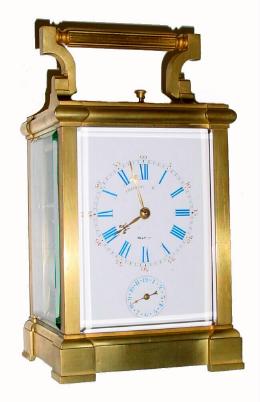 C.1900, French, Brass Cased Carriage Clock, Grand Sonnerie, in an elegant block style case, with a good porcelain dial with blue Roman numerals and red Arabic 5 minute markers. — Antique Clocks Price Guide