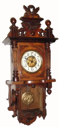 C.1900, German, Berlin Style Free swinger, with glass cover over pendulum. — Antique Clocks Price Guide