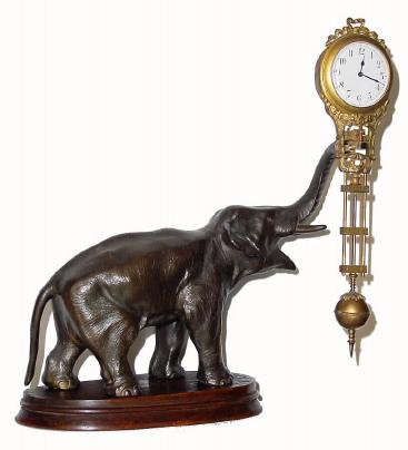 C.1910, German, Junghans, "ELEPHANT" swing clock in excellent original condition. — Antique Clocks Price Guide