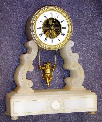 C.1890, French, Swinging Doll timepiece in good original condition. — Antique Clocks Price Guide