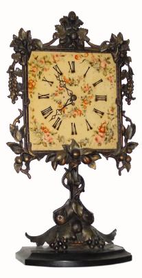 C.1900, German, night clock timepiece, 30-hour, in very nice condition with an original bronze finished iron frame &amp; stand. — Antique Clocks Price Guide