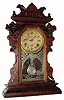 C.1890, Waterbury Clock Co., 8-day time & strike walnut Gingerbread in generally good as-found condition.