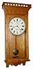 A C.1900, Self Winding Clock Movement "Model B", now in a modern oak case,