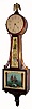 C.1935, Waltham Clock Co., 8-day mahogany banjo timepiece in generally fair to good condition with an original finish, but with a poorly replaced throat glass, and now a New Haven eagle.