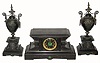 C.1905, Japy Freres, French 8-day time/strike black and contrasting marble garniture set in fair to good condition with the top corners broken off and chips and roughness on the sharp edges of the case.