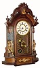 C.1911, New Haven Clock Co., "Occidental" 8-day time/strike walnut mantel clock in generally good restored condition.