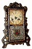 C.1852, E. & A. Ingraham, Bristol, Conn.,  30-hour time/strike/alarm scroll front shelf clock.