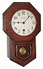 C.1911, Waterbury Clock Co., "Daintie No. 2", 8-day schoolhouse timepiece in good condition with a grain painted case.