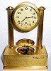 C.1935, Swiss, Brightly gilded ormolu singing bird box with integral alarm clock.