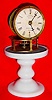 C.1853, Terryville Mfg Co., Terryville, Conn., candle stand timepiece with white paper dial and horizontal balance wheel for control of the 30 hour movement.