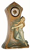 C.1900, A Schoop Pottery case, with a German 30 hour fit up movement that ticks and stops.