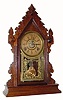 C.1904, E. Ingraham & Co., "Cadet", 8-day time/strike/alarm refinished walnut mantel clock in very nice condition. 