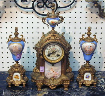 A FRENCH PORCELAIN CLOCK GARNITURE SET. Ormolu and porcelain, clock with two urns. — Antique Clocks Price Guide