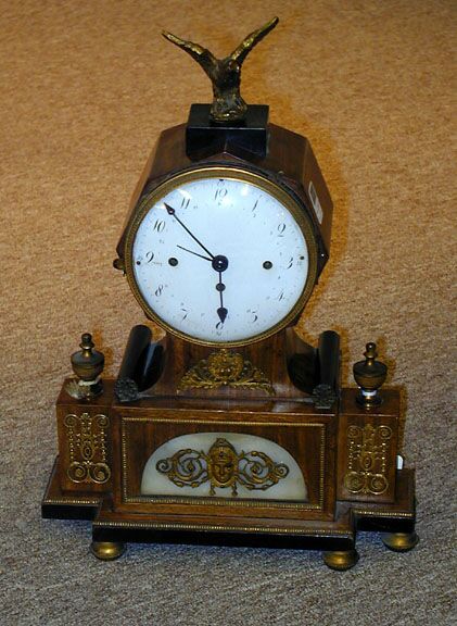 A FRENCH EMPIRE STYLE GILT BRONZE MOUNTED MANTEL CLOCK, — Antique Clocks Price Guide