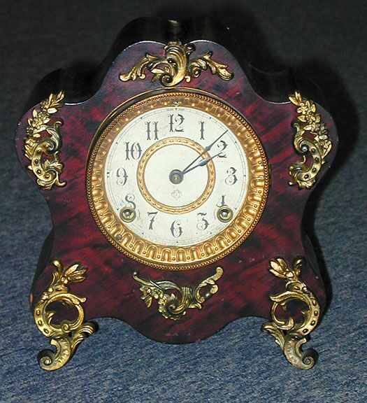 AN ANSONIA GILT METAL MOUNTED FAUX TORTIOSE MANTLE CLOCK. — Antique Clocks Price Guide