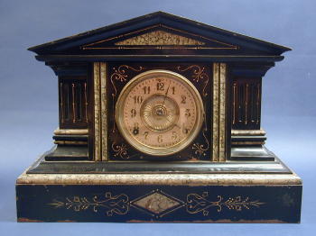 AN AMERICAN EBONIZED AND MARBLIZED CAST IRON MANTLE CLOCK, 19th century, mechanism stamped 'ANSONIA CLOCK/U.S.A./NEW YORK'. — Antique Clocks Price Guide