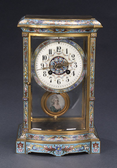 A FRENCH CHAMPLEVE ENAMEL AND GILT BRASS MANTEL CLOCK, early 20th century, the works stamped Japy Freres. — Antique Clocks Price Guide