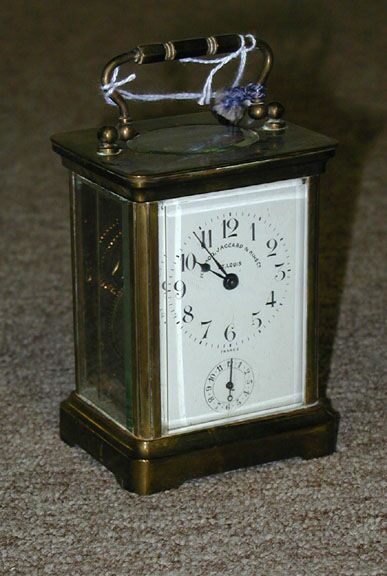 A FRENCH BRASS AND GLASS CARRIAGE CLOCK, the works stamped Duverdrey &amp; Bloquel, retailed by Memod, Jacquard &amp; King, St. Louis. — Antique Clocks Price Guide
