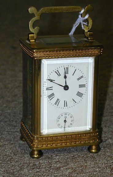A BRASS CARRIAGE CLOCK, late 19th century. — Antique Clocks Price Guide