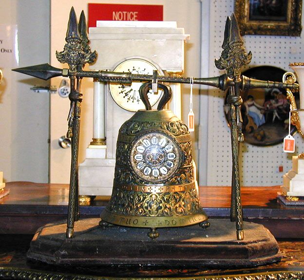 A GILT-METAL SANTUS BELL CLOCK, Late 19th/early 20th century. — Antique Clocks Price Guide