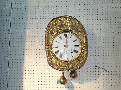 A FRENCH MOLDED BRASS WALL CLOCK, 19th century. — Antique Clocks Price Guide