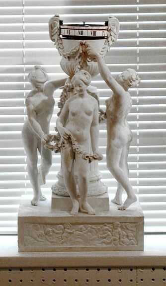 A PARIAN FIGURAL ANNULAR CLOCK, late 19th century. — Antique Clocks Price Guide