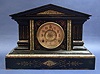 AN AMERICAN EBONIZED AND MARBLIZED CAST IRON MANTLE CLOCK, 19th century, mechanism stamped 'ANSONIA CLOCK/U.S.A./NEW YORK'
