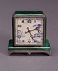 AN ART DECO SILVER AND MALACHITE CLOCK, Zenith Watch Co., Switzerland, no. 5102.