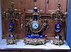A CONTEMPORARY CLOCK GARNITURE SET.