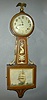 AN INGRAHAM EIGHT DAY BANJO CLOCK.