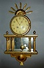 A LOUIS XVI STYLE GILTWOOD WALL CLOCK, The works stamped Westerstrands, Made in Sweden.