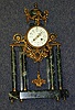 A LOUIS XVI STYLE GILT METAL MOUNTED GREEN MARBLE MANTLE CLOCK,