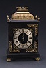 A FRENCH GILT BRONZE AND EBONIZED WOOD BRACKET CLOCK, late 19th century, movement impressed with Japy Freres mark and 'BEST RACK/8017/55', pendulum impressed '8017'.