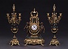 A THREE-PIECE GILT METAL AND MARBLE CLOCK GARNITURE, 20th century, dial inscribed 'Imperial/MADE IN ITALY'.