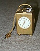 A SWISS GILT METAL SMALL CARRIAGE CLOCK, the works stamped Breve, the face inscribed Vacheron & Constantin, Geneva.