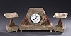 A FRENCH ART DECO GILT METAL-MOUNTED MARBLE THREE-PIECE CLOCK GARNITURE, circa 1925, Japy Freres.