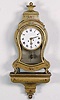 A LOUIS XV PROVINCIAL STYLE PAINTED WOOD BRACKET CLOCK, late 19th century.