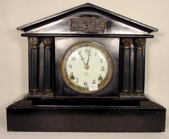 Ansonia black metal table clock — Antique Clocks Price Guide