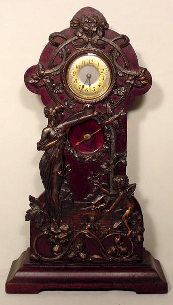 Art Nouveau brass decorated Junghans table clock — Antique Clocks Price Guide
