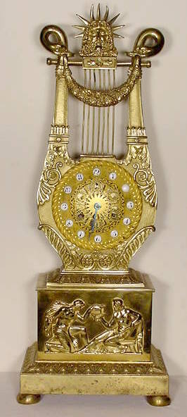 Brass lyre shaped table clock — Antique Clocks Price Guide