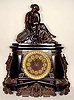 Ansonia black metal with ornate brass trim