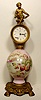 Ansonia clock with scenic and floral glass center,