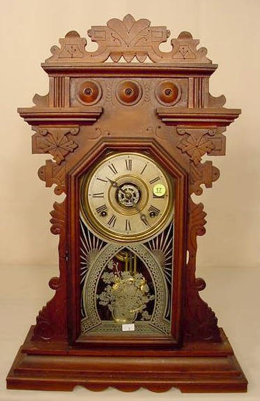 Ingraham walnut parlor clock: with alarm; original finish. — Antique Clocks Price Guide